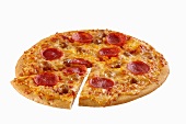 Pepperoni and Sausage Pizza with a Slice Partially Removed; White Background