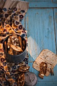 Biscotti with dried figs in a biscuit tin
