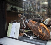 Smoked Pork Leg in a Storefront Window in Spain