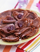Chocolate crêpes with jam