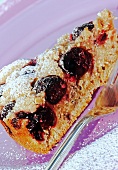 close up of a slice of cherry cake