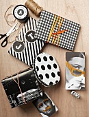 Wrapping tips for presents; black and white gift wrap in spotted, striped and houndstooth patterns