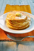 Pancakes with butter and maple syrup