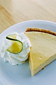 A slice of Key Lime Pie with whipped cream