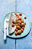 Sea bass with cherries and potatoes