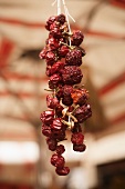 Dried Red Peppers Hanging in Ortigia Market in Siracusa, Sicily