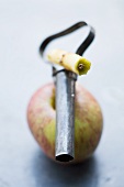 An apple and a corer