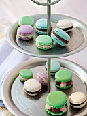 Assorted macaroons on a tiered cake stand