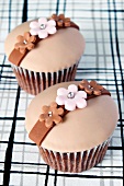 Chocolate cupcakes decorated with flowers
