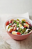 Vegetable salad with tuna and basil