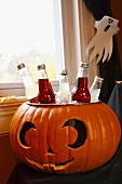 Bottled Drinks Cooling in a Pumpkin Ice Bucket