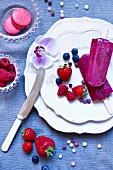 Home-made berry ice lollies