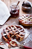 Individual shortcrust pastry tarts with plum jam