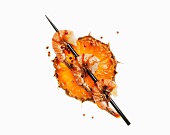 Pineapple and Shrimp Skewer on a White Background