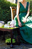 Woman taking tea in garden