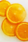 Frozen slices of orange