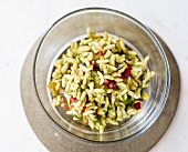 Puffed rice with pomegranate seeds and coriander leaves