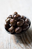 Marinated olives in a small bowl