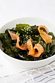 Wakame salad with smoked salmon and wasabi sesame seeds