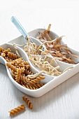 Assorted wholemeal pasta (fusilli, Spätzle (egg noodles from Swabia), ribbon pasta)