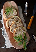 Rolled Dill Omelet with Mushroom and Ricotta; Sliced on a Platter