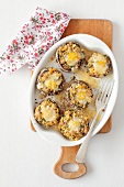 Stuffed mushrooms with bacon and quail's eggs