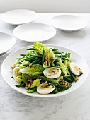Green bean salad with hard-boiled eggs and walnuts