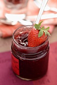 A jar of strawberry jam