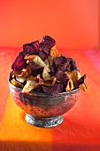 Assorted vegetable crisps in a silver bowl