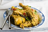 Chicken curry with almonds, chillies and coriander leaves