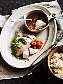 Chicken broth with poached chicken and rice