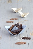 Chocolate fish and paper boats