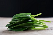 Fresh baby spinach leaves, stacked