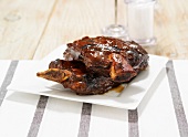 Barbecued beef ribs with barbecue sauce