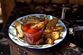 Potato wedges with ketchup