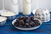 Frozen blackberries and semolina pudding