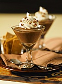 Chocolate and mocha mousse topped with whipped cream