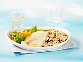 Fillet of fish with rice and vegetables