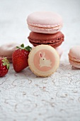 Assorted macaroons with fresh strawberries