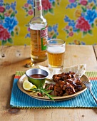 Barbecued pork with spicy chocolate sauce and beer