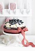 Flourless chocolate cake with cream and berries