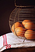 Brown Eggs in a Wire Basket