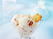 Cherry ice cream with a leaf-shaped vanilla wafer