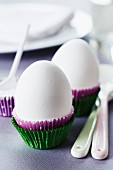 Paper truffle cases used as egg cups
