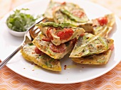 Omelette with asparagus and tomatoes