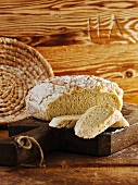 Rustic French bread, partly sliced
