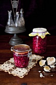 Jars of Pickled Cabbage; Garlic Bulbs