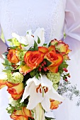 Bridal bouquet with roses and lilies