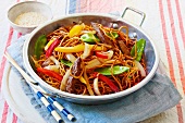 Fried noodles with teriyaki beef and vegetables (Asia)