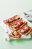 Puff pastry tarts with lamb and tomato salsa
